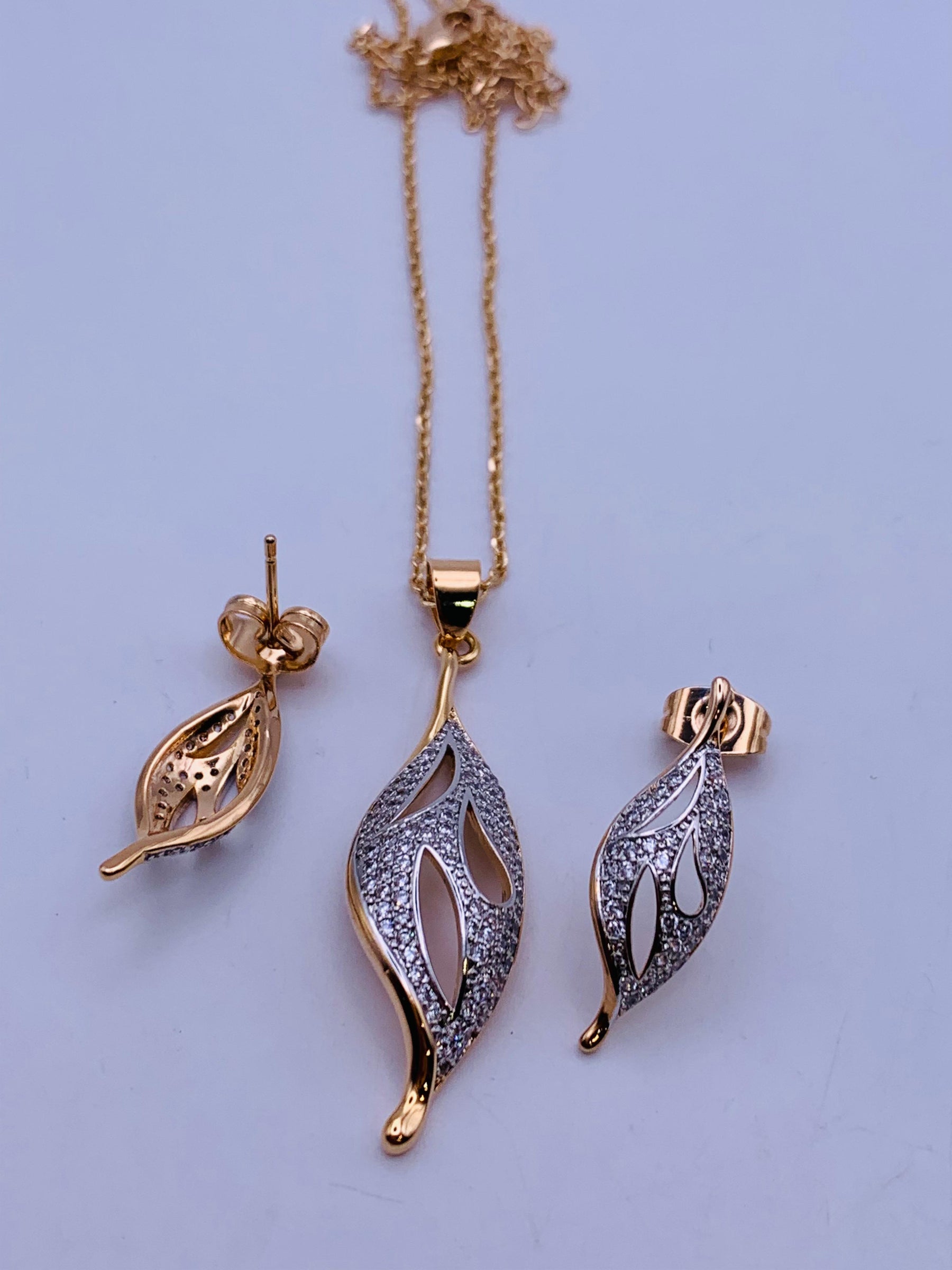 KN Silver and Golden American Diamond Alloy Pendant Set